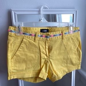 Yellow shorts with patterns